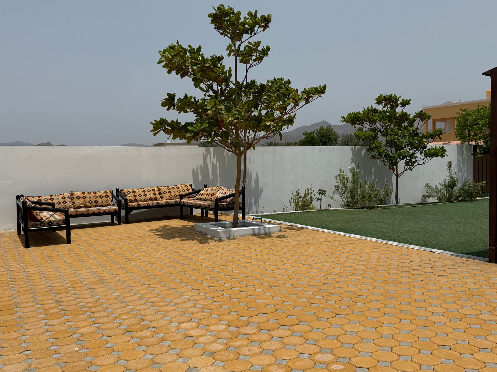 AL Fay Resort Outdoor Seating Area with scenic views